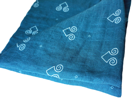 Presenting the Blue Ram Muslin Swaddle. The design was made by our in house Hmong artist and features a gender neutral styling and color way.