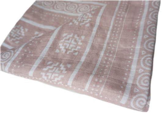 The pink batik muslin swaddle is new for Spring 2022. Use them for different situations, either as a blanket or decoration.